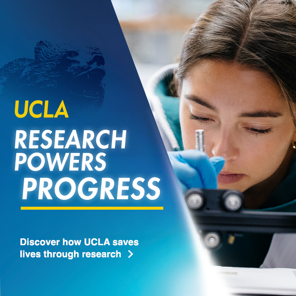 Close up of a woman's face working in a lab